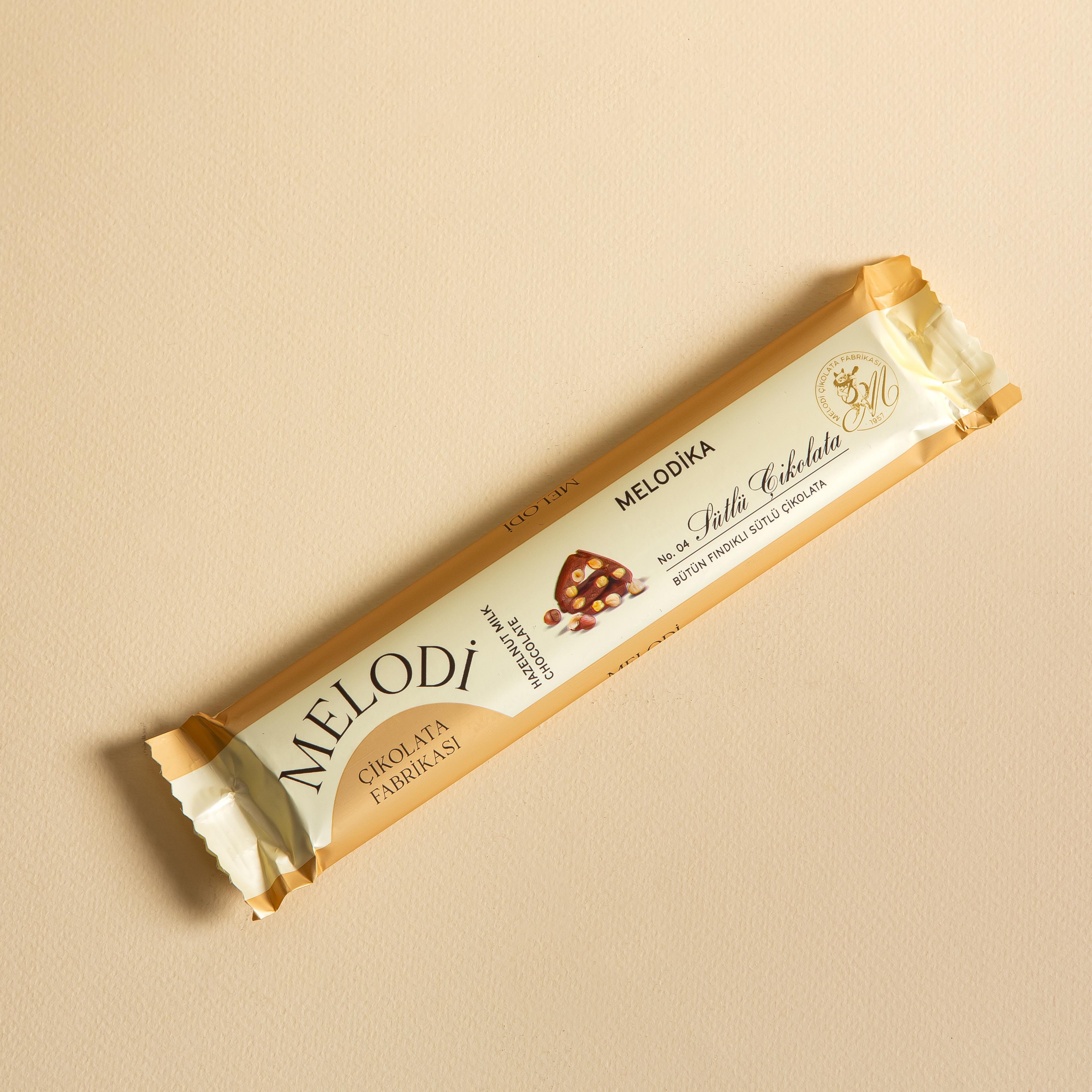MELODİKA BÜTÜN FINDIKLI SÜTLÜ ÇİKOLATA 0P.010086